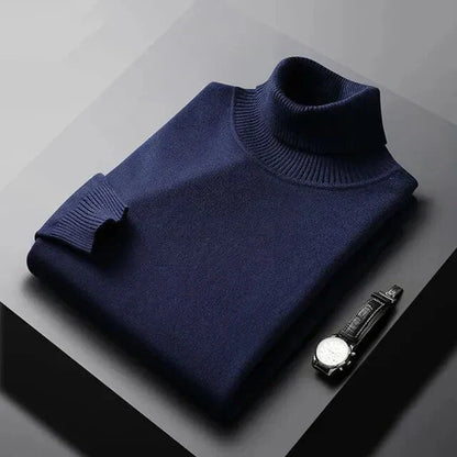 Col roulé en cachemire bleu marine plié, col cheminée haut côtelé.