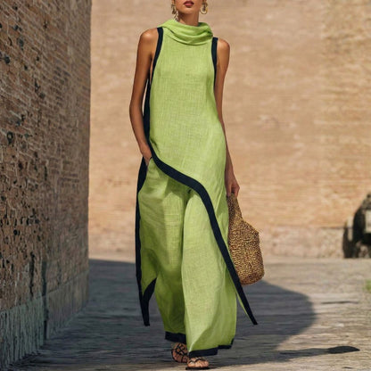 Robe longue en lin verte sans manches, col drapé, bordures contrastées bleu nuit.