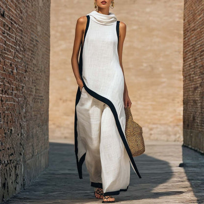 Robe longue en lin blanche sans manches, col drapé, bordures contrastées bleu nuit.