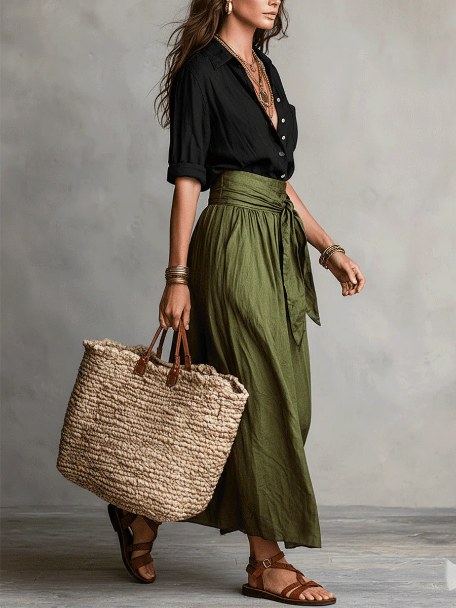 Ensemble : t-shirt noir boutonné manches bouffantes, jupe mi-longue vert olive froncée