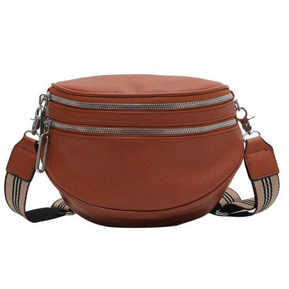 Sac à bandoulière brun arrondi, double fermeture éclair et bandoulière réglable
