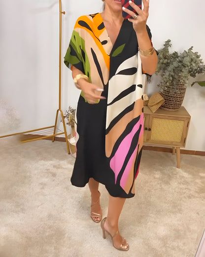 Robe décontractée mi-longue ample, col V, fond noir à motif abstrait multicolore