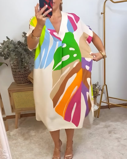 Robe décontractée mi-longue ample, col V, fond clair à motif abstrait multicolore