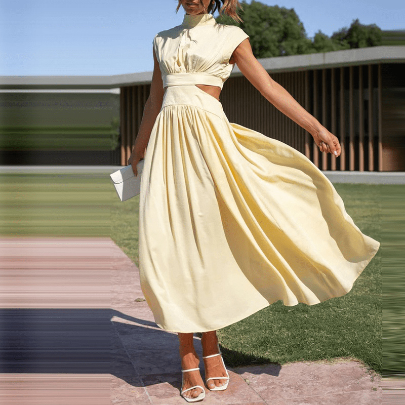 Robe longue jaune crème, col haut manches courtes, taille froncée et jupe bouffante