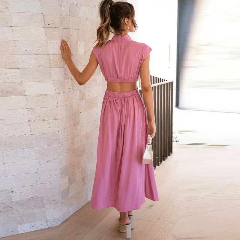 Robe longue rose à manches courtes bouffantes, taille froncée et jupe évasée