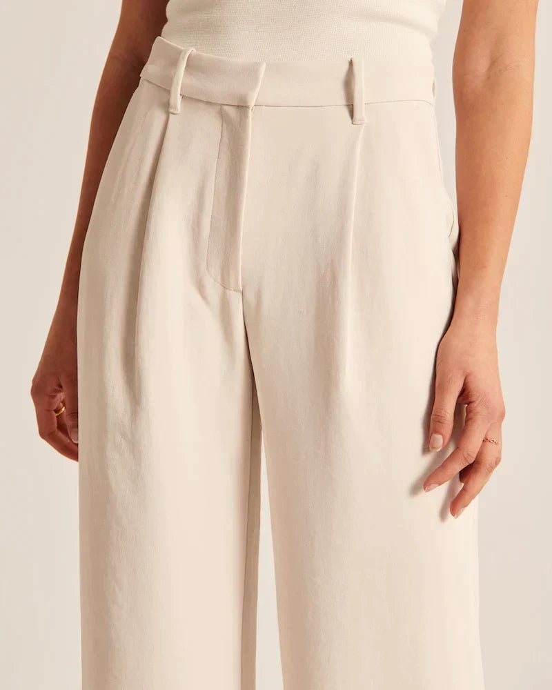 Pantalon ample beige clair à taille élastiquée avec passants et poches