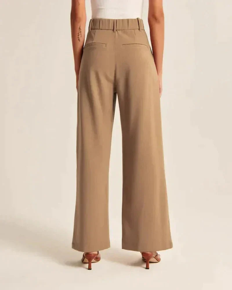 Pantalon long beige taupe à taille haute et passants, coupe ample