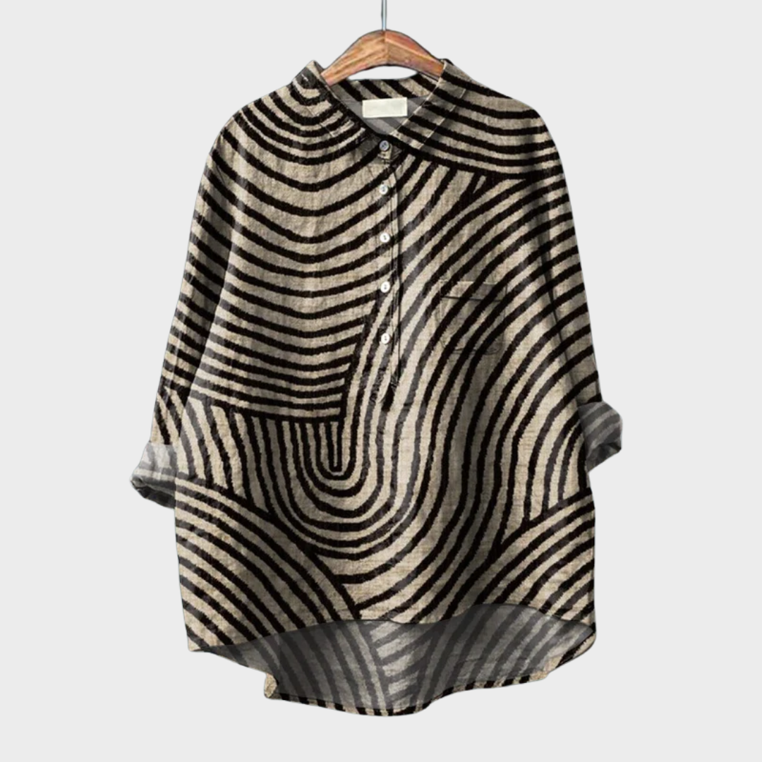 Blouse graphique rayée noire et écrue sur cintre, manches amples, boutonnage