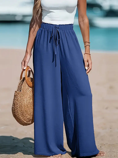 Pantalon ample taille haute bleu nuit, taille élastiquée et lien à nouer