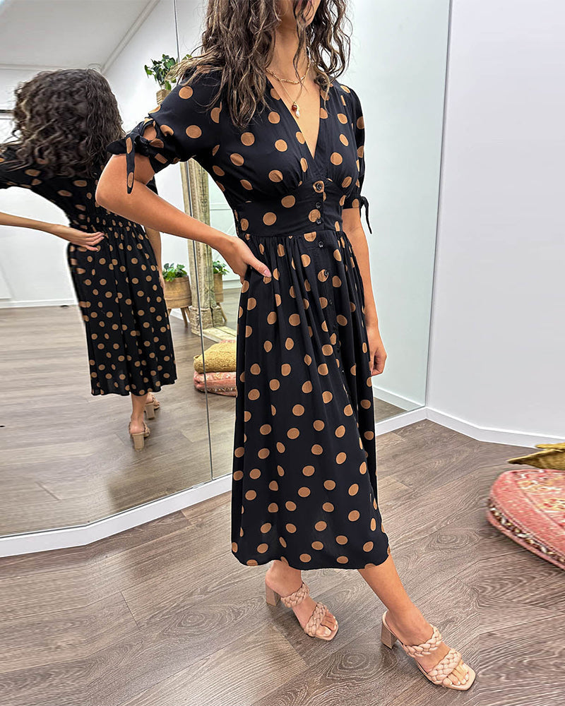 Robe midi Miley noire à pois, col en V, manches trois-quarts bouffantes, ceinture