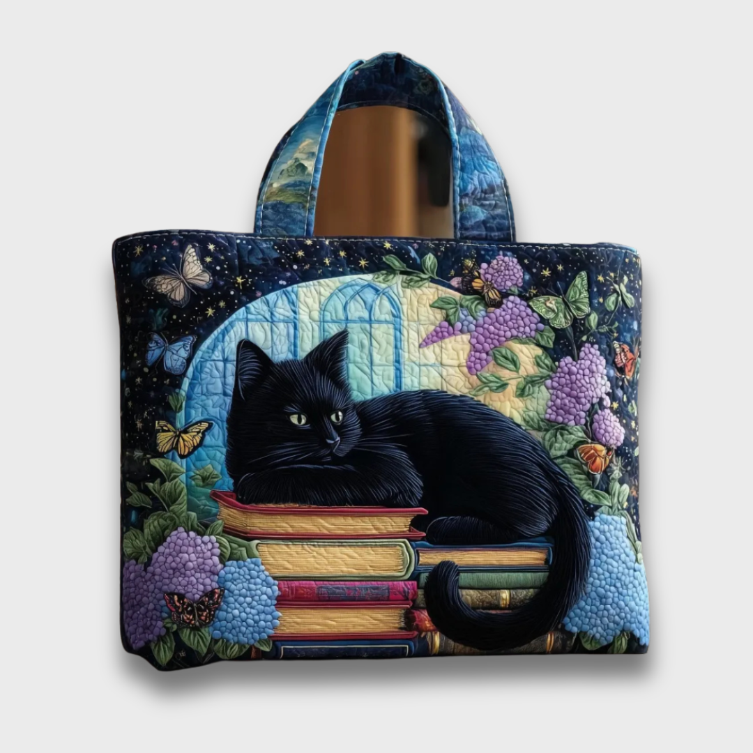 Sac décontracté en tissu bleu nuit, anse en tissu, motif chat noir et fleurs.