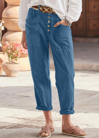 Pantalon élégant bleu à poches et patte boutonnée devant, taille mi-haute
