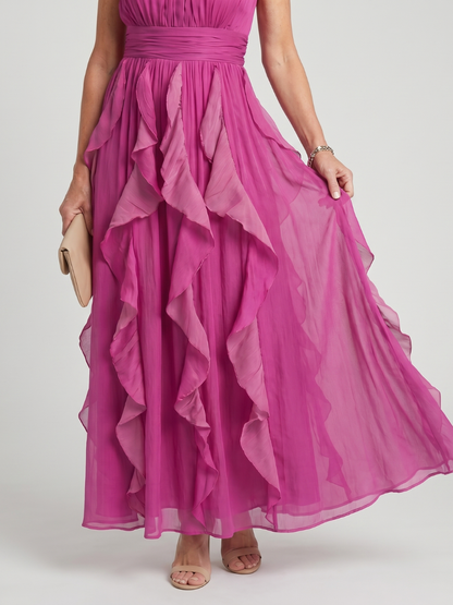 Robe longue rose à col montant, sans manches, jupe à volants superposés et fronces