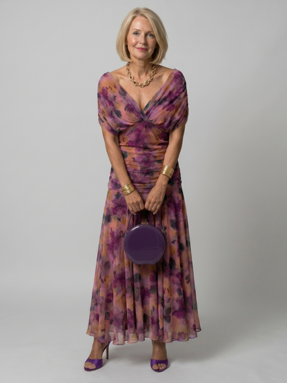 Robe longue midi à épaules dénudées, décolleté en V noué, robe fluide à motifs violets.