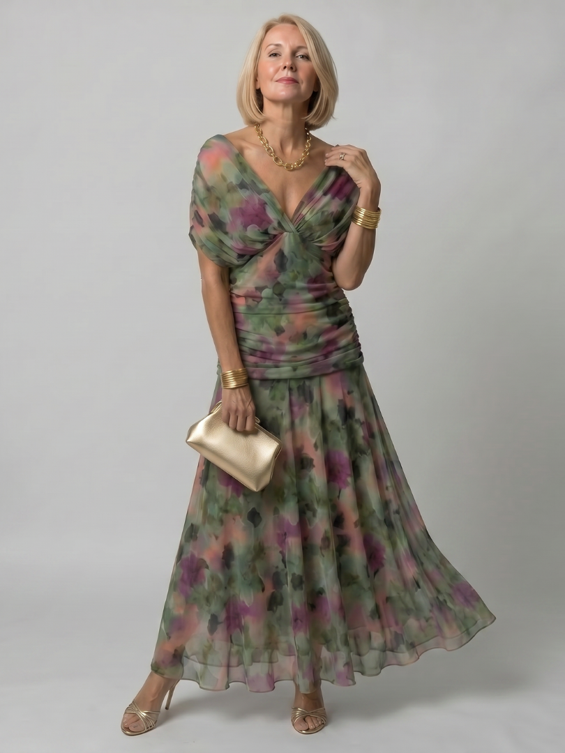 Robe longue midi à épaules dénudées, décolleté en V noué, imprimé floral vert et violet.