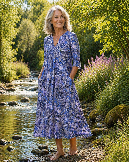 Robe d’été élégante Queenie bleue à col V et manches trois-quarts, imprimé fleuri