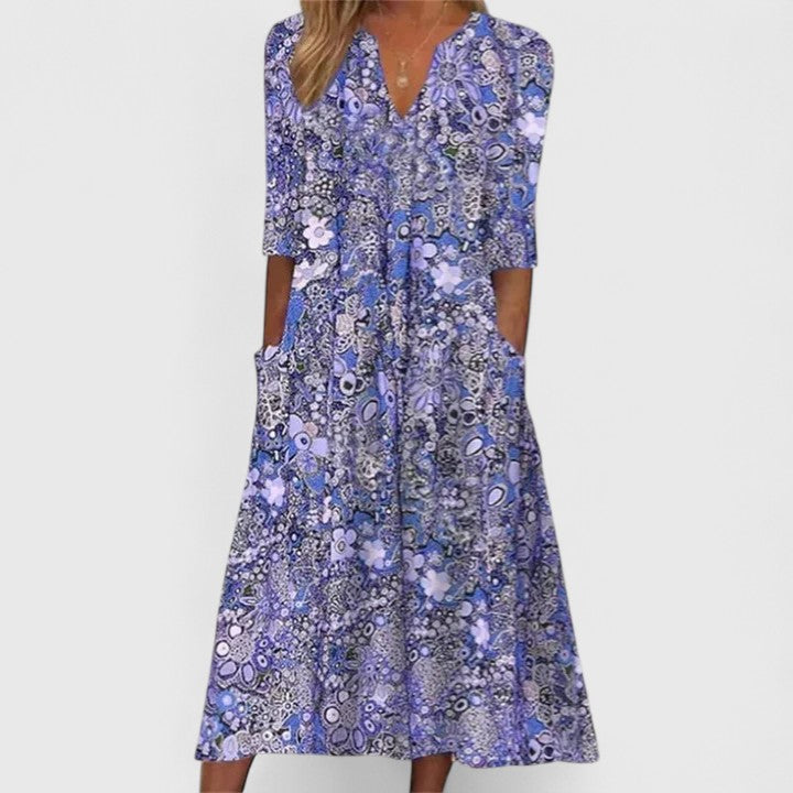 Robe d’été élégante Queenie bleue à col V, manches trois-quarts, coupe évasée