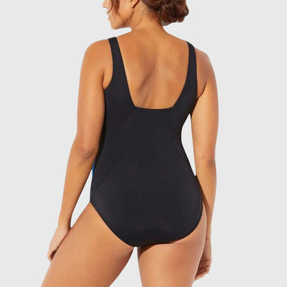 Maillot de bain sculptant une pièce noir à bretelles larges et dos échancré.