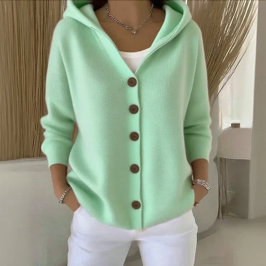 Gilet à capuche vert menthe, fermeture boutonnée, manches longues, style décontracté.