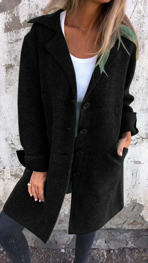 Manteau chic minimaliste noir à col cranté et fermeture boutonnée