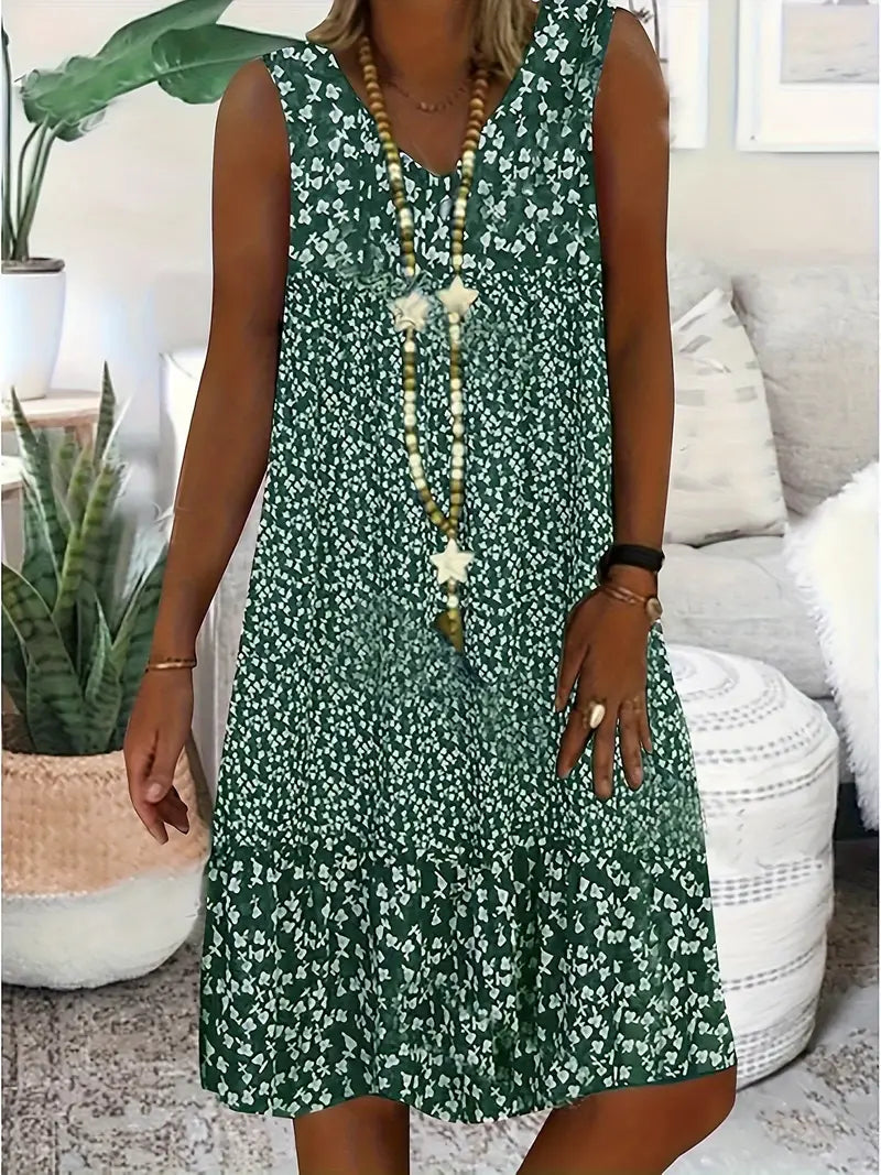 Robe sans manches encolure V, motif fleurs vert, boutonnière à perles.