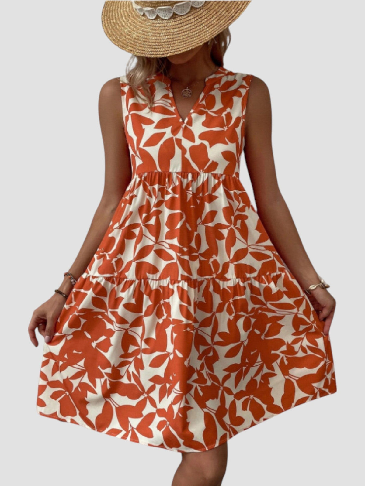 Robe d’été midi sans manches imprimée feuilles, rouge orangé, volants à la taille