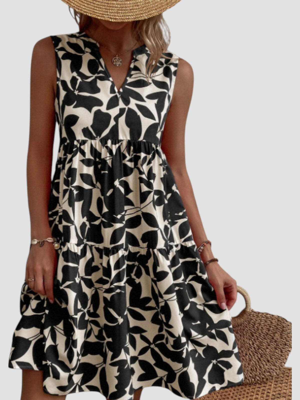 Robe midi sans manches imprimé feuilles noir et blanc, encolure V, taille froncée