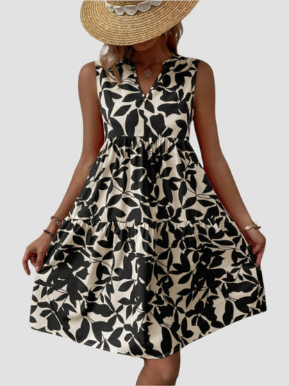 Robe d’été midi sans manches imprimé feuilles, noir et blanc, jupe évasée à volants