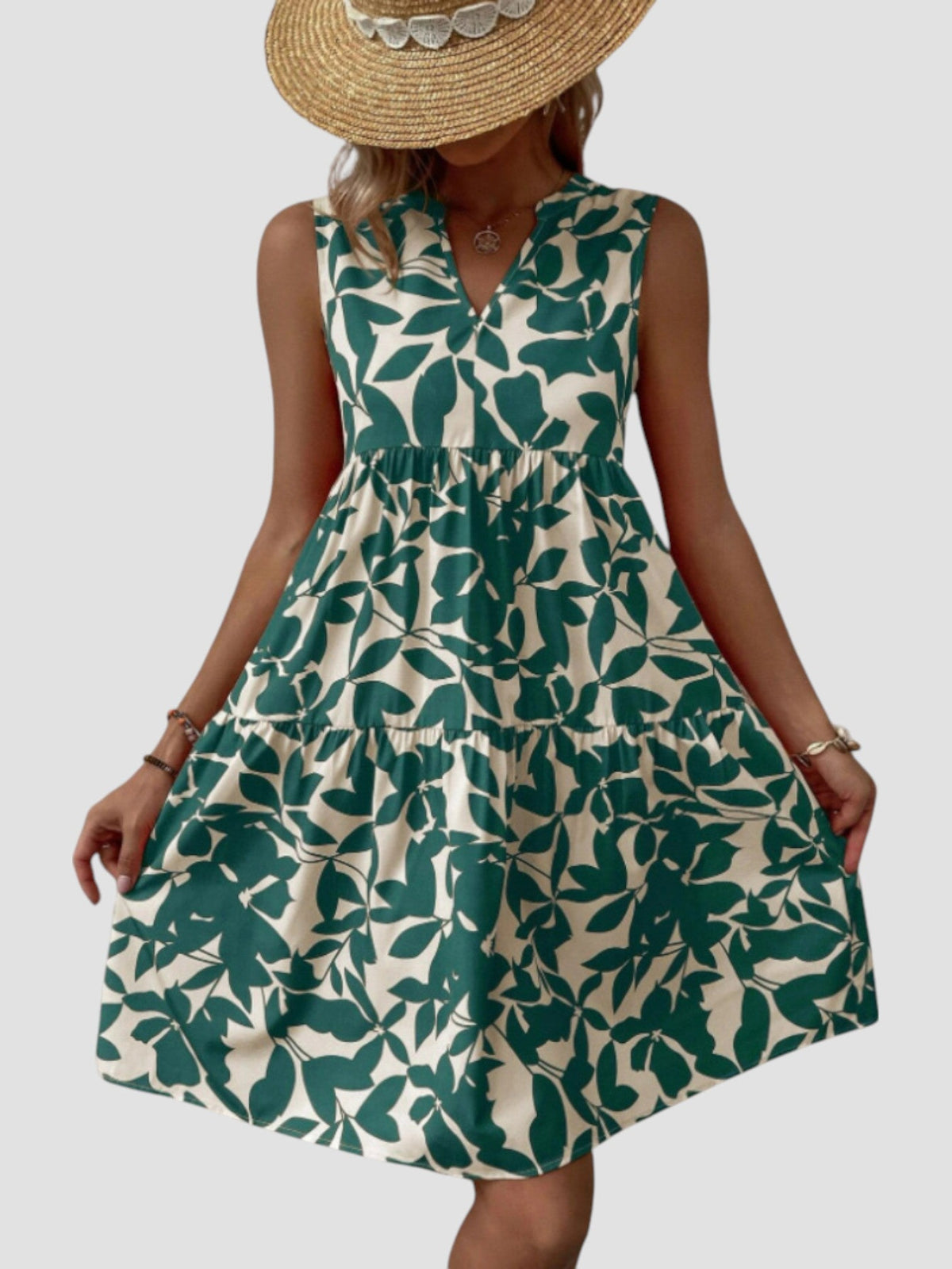 Robe midi sans manches imprimé feuilles vert, encolure V, taille froncée et jupe évasée