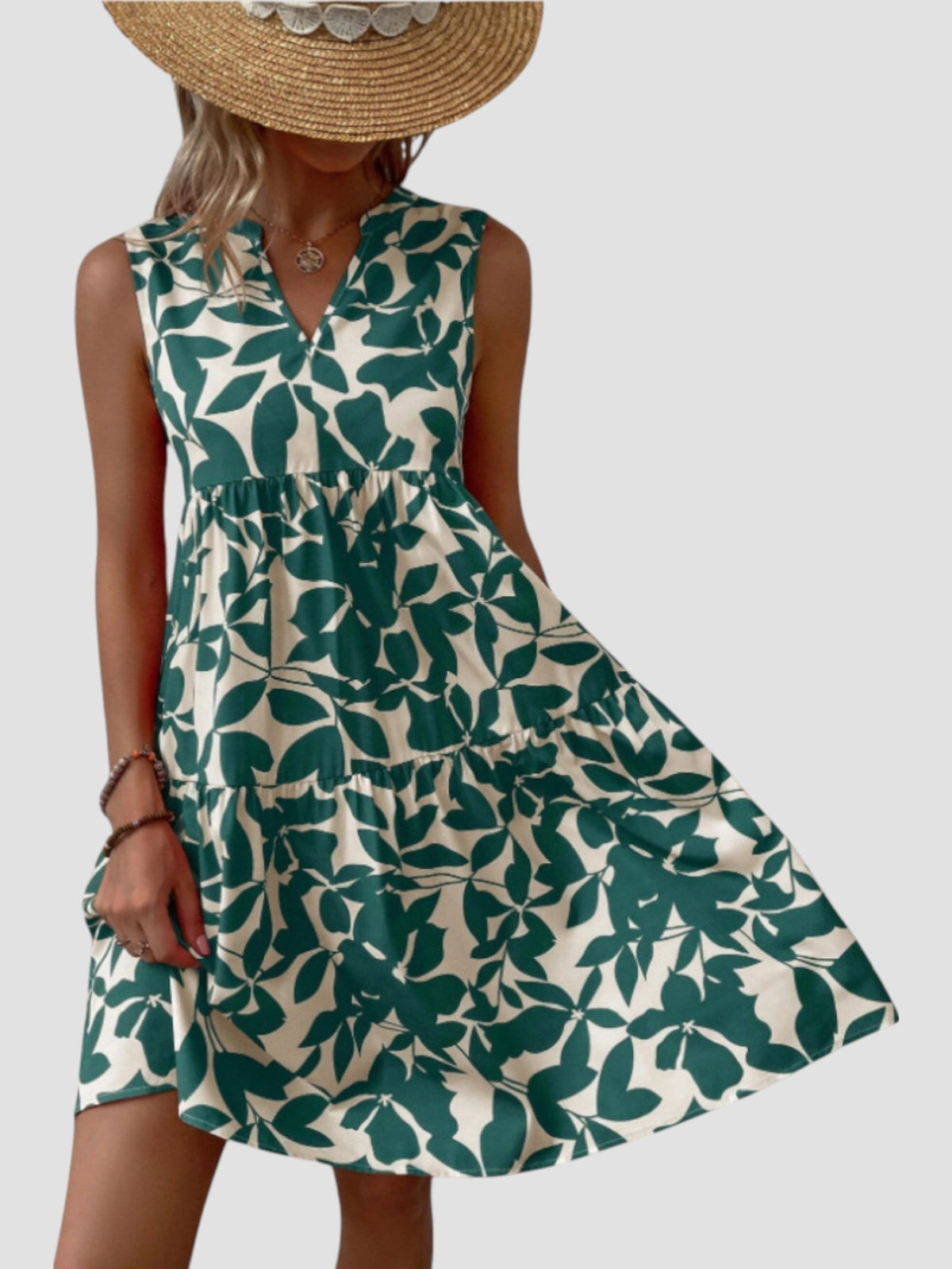 Robe d’été midi sans manches imprimée feuilles vert, encolure V, volant à la taille