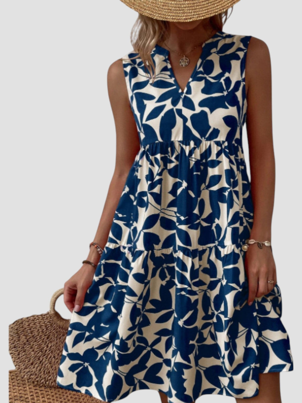 Robe midi sans manches imprimé feuilles bleu, encolure V, taille froncée et jupe évasée