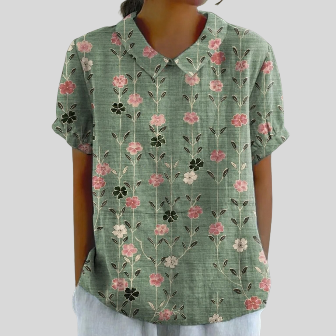 Blouse femme verte à fleurs verticales, manches courtes, encolure en V