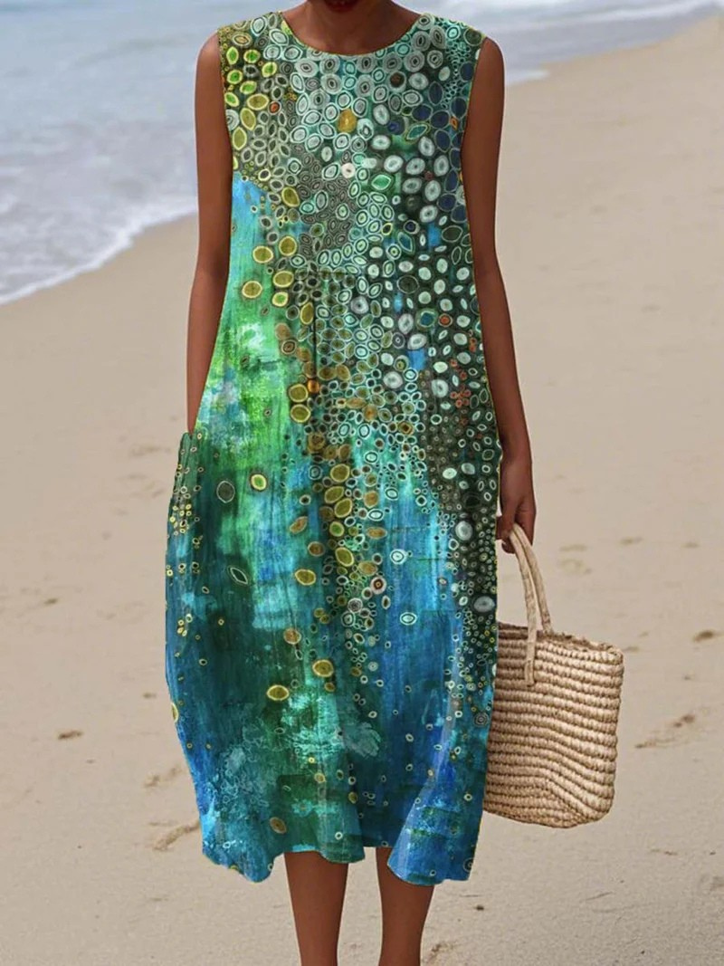 Robe sans manches à motif cercles vert-bleu, encolure ronde, mi-longue.