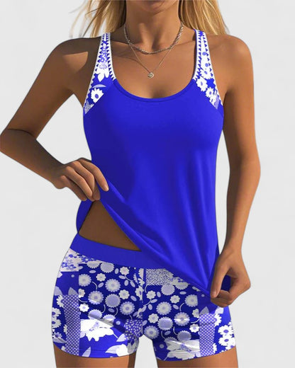 Maillot de bain confortable bleu, bretelles à motifs et short imprimé fleuri