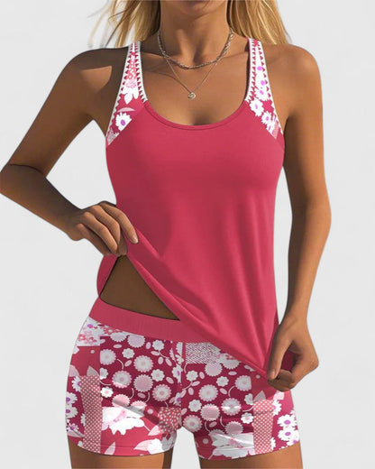 Maillot de bain confortable Aurianna rose : top dos nageur et short imprimé fleurs rose/blanc