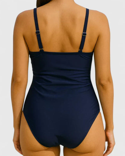 Maillot de bain une pièce bleu marine, bretelles réglables, dos nageur échancré.
