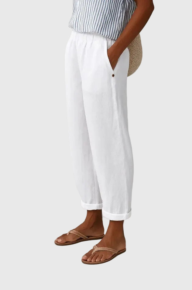 Pantalon blanc ample en lin, taille élastique, ourlet retroussé, bouton décoratif