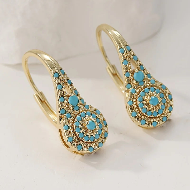 Boucles d’oreilles créoles dorées turquoise, motif floral émaillé et strass