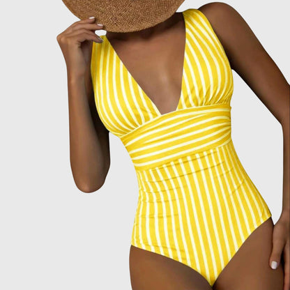 Maillot de bain une pièce jaune rayé, décolleté plongeant, coupe gainante.