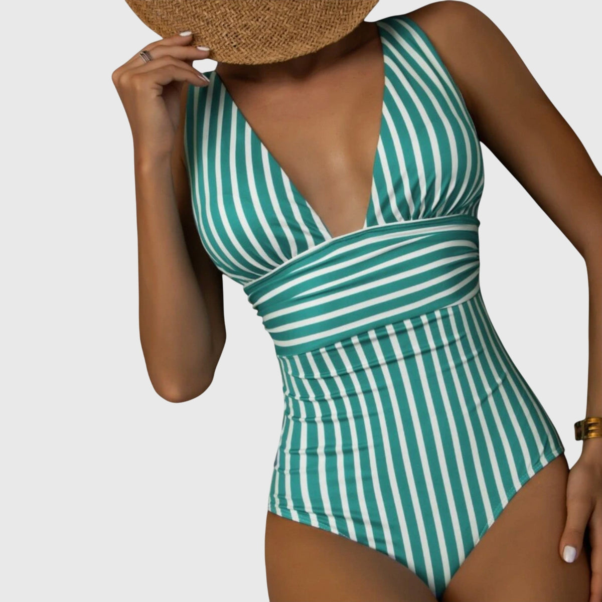 Maillot de bain une pièce vert rayé, décolleté plongeant V, manches courtes