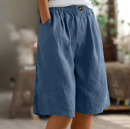 Short en coton bleu, taille élastique, coupe ample, bouton devant