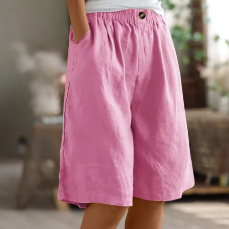 Short en coton rose, taille élastique, coupe ample, bouton devant