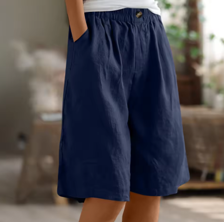 Short en coton bleu marine, taille élastique, coupe ample, bouton devant