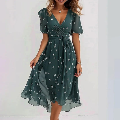 Robe mi-courte vert foncé à imprimé petites fleurs, manches volantées, décolleté V