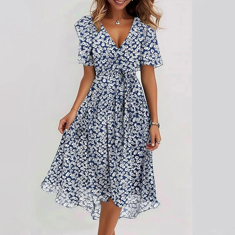 Robe courte bleu marine à imprimé fleurs blanches, manches courtes volantées, V
