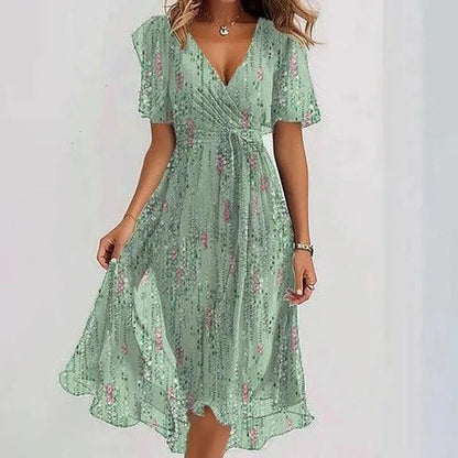 Robe mi-courte vert d’eau à manches volantées, imprimé fin et décolleté en V