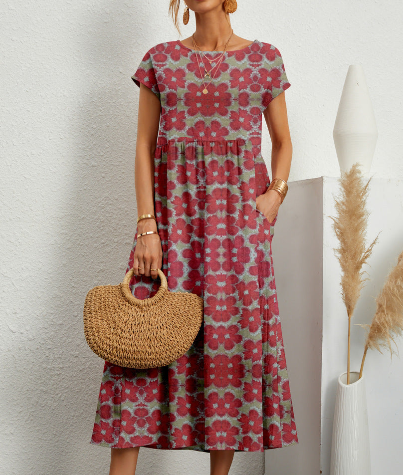 Robe florale à manches courtes rouge, imprimé fleurs roses, coupe évasée mi-longue