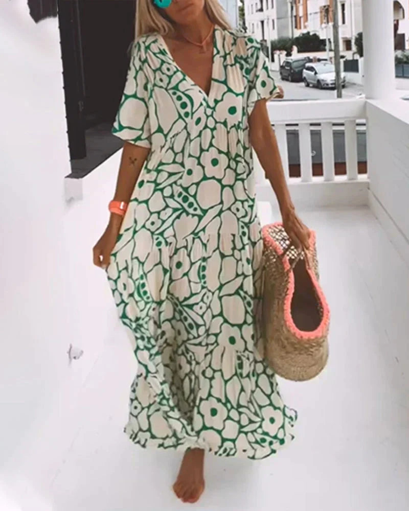 Robe d’été légère verte à motif géométrique, décolleté en V, manches courtes, longue.