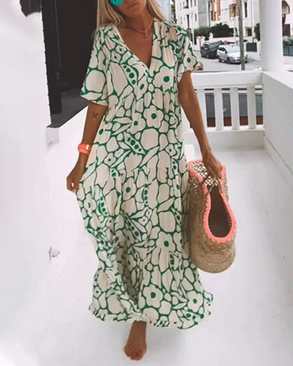 Robe d’été légère verte à motif géométrique, décolleté en V, manches courtes, longue.