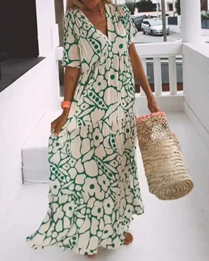 Robe d’été légère verte à motif géométrique, col en V, manches courtes, ourlet évasé.